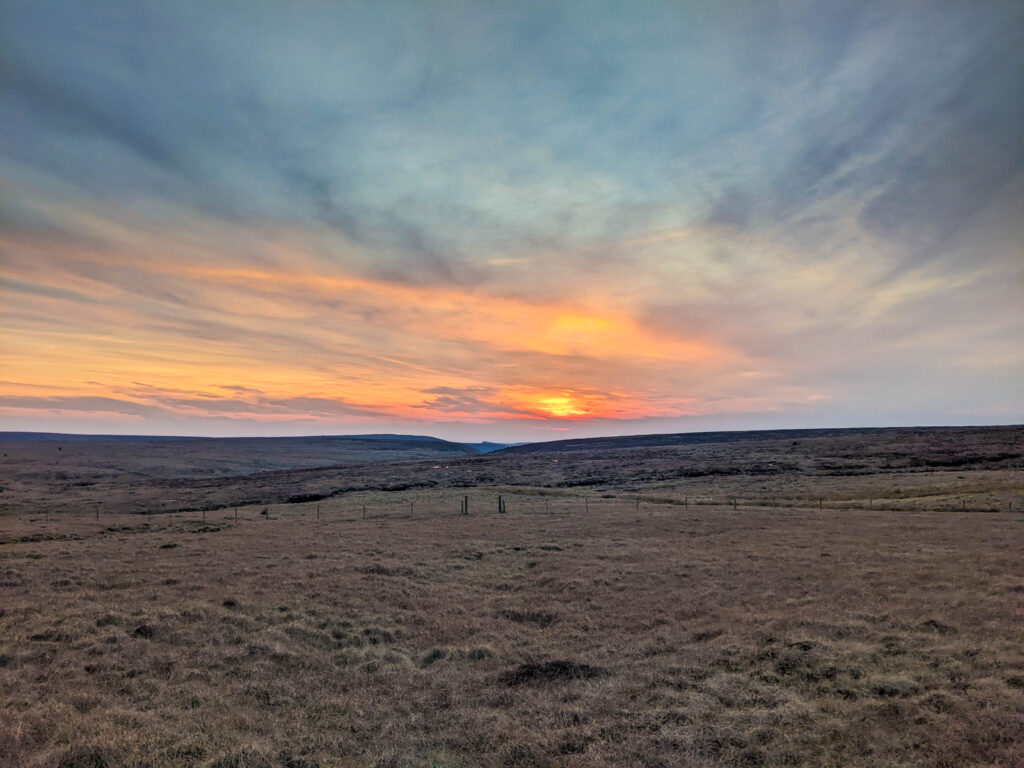 Peaceful sunset over moorland